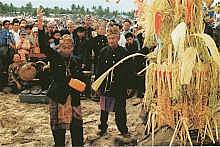 Bapa Kaul or leader of the ceremony invokes the spirits and pours water over the offerings